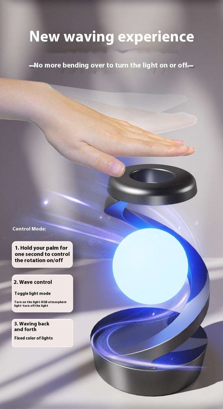 Rotating hanging mobile phone wireless charging lamp with wave control.