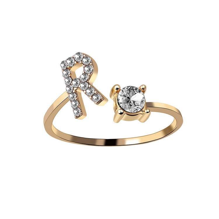 Elegant adjustable gold ring with zircon-studded initial letter R, ideal fashion jewelry.