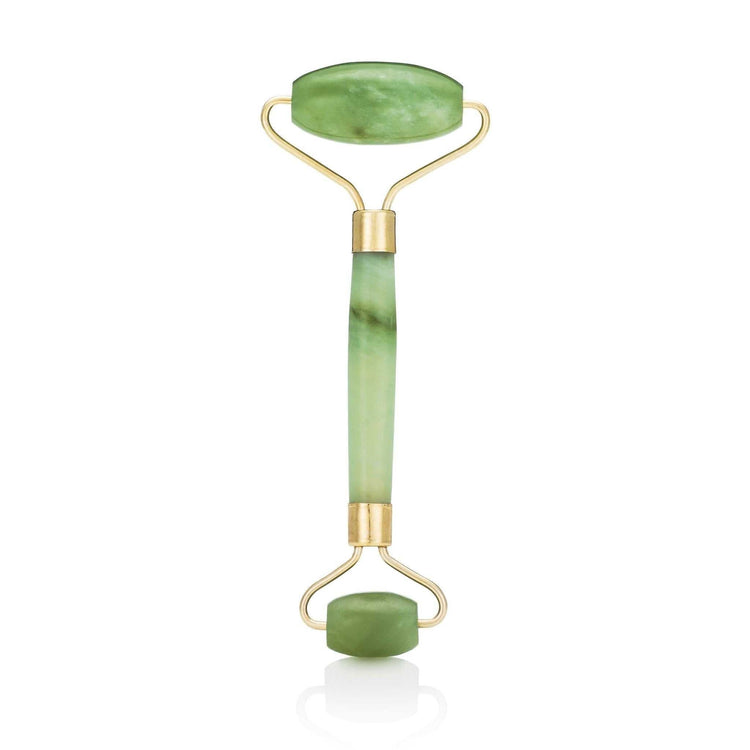 Jade roller for radiant skin and relaxation, promotes circulation and reduces puffiness.