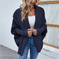 Knitted bat sleeve cardigan with solid color lapel, stylish winter fashion jacket.