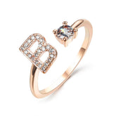 Adjustable 26 initial letter ring with zircon stones and elegant design for women.