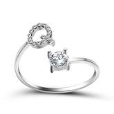 Elegant adjustable initial letter ring with zircon stone, featuring a unique and fashionable design for women.