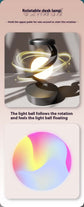 Rotating hanging mobile phone wireless charging lamp with light ball feature.