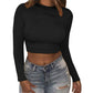 Stylish black croc top with long sleeves paired with jeans, showcasing trendy style and comfort.