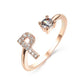 Elegant adjustable ring with initial letter R and zircon stone in copper alloy, stylish jewelry design for women.