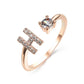 Elegant adjustable initial letter ring with zircon embellishments, stylish copper alloy design for women.