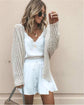 White cardigan sweater, street style, plain pattern, European and American fashion.