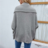 Knitted bat sleeve cardigan in solid color, perfect for winter fashion.