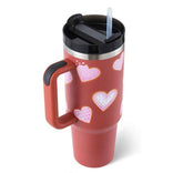 Thermos cup with handle and straw, insulated, heart design, red with black lid.