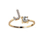 Elegant adjustable initial letter ring for women featuring a zirconia stone in a vintage design.