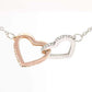 Double Heart Necklace in two-tone peach design, personalized heart pendant.