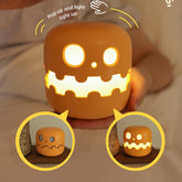 Pumpkin lamp bedside with glowing LED, soft silicone design, and pop-up light feature.