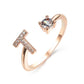 Elegant adjustable initial letter ring with zircon, copper alloy design for women in rose gold.