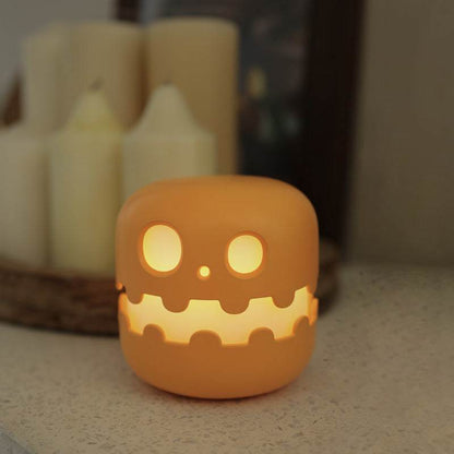 Pumpkin Lamp Bedside with soft glowing LED light on a tabletop setting.