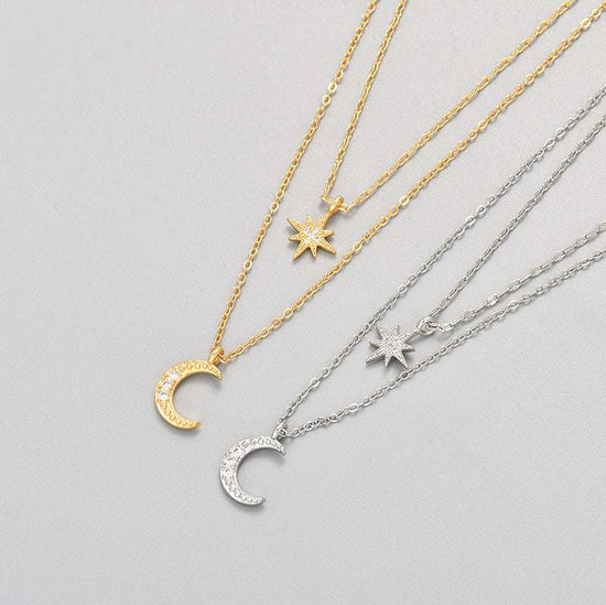 Moon double-layer necklace in yellow and white gold with star and moon pendants, clavicle chain design.