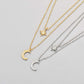 Moon double-layer necklace in yellow and white gold with star and moon pendants, clavicle chain design.