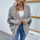 Knitted bat sleeve cardigan in solid color, perfect winter fashion jacket.