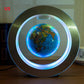 Floating world map globe defies gravity with ambient LED lighting and sleek silver frame.