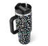 Stylish thermos cup with handle and straw, featuring a colorful pattern design.