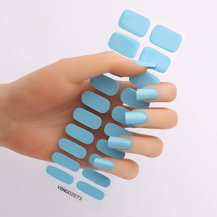 Gel nail stickers in light blue for semi-curing with heating lamp.