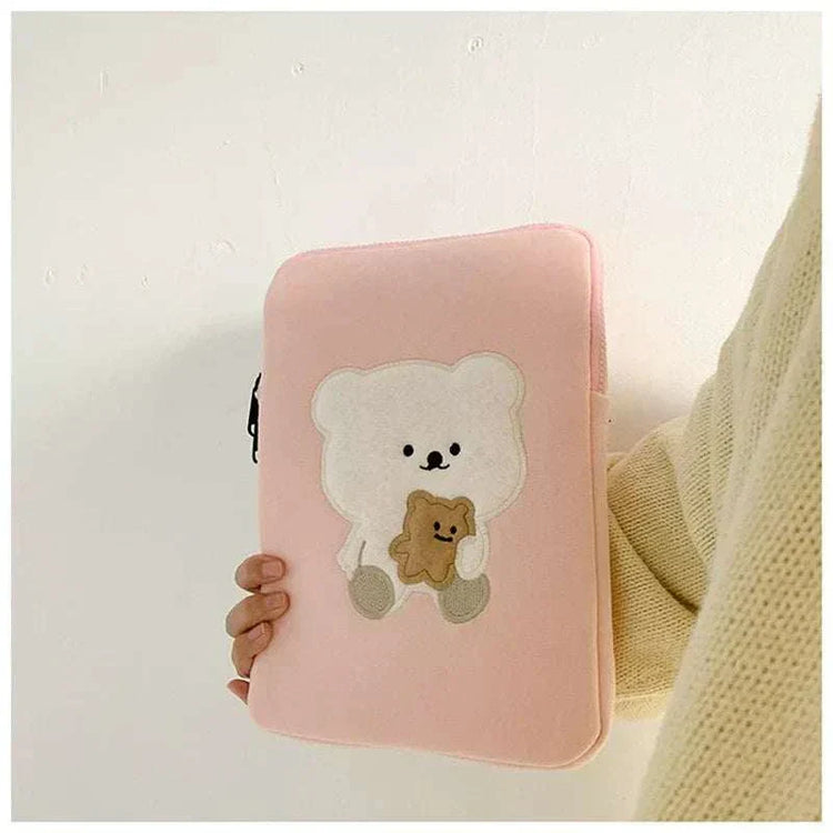 Cute pink laptop sleeve with bear design for women, protective pouch for tablets and laptops.