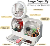 Cosmetic display case with touch screen LED light, multiple compartments, and mirror for organized beauty storage.