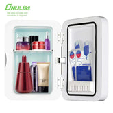 White mini refrigerator for skincare, portable and frost-free, with mirror glass panel and light for cosmetics storage.