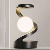 Floating moon table lamp with modern design and gesture-controlled RGB lighting.