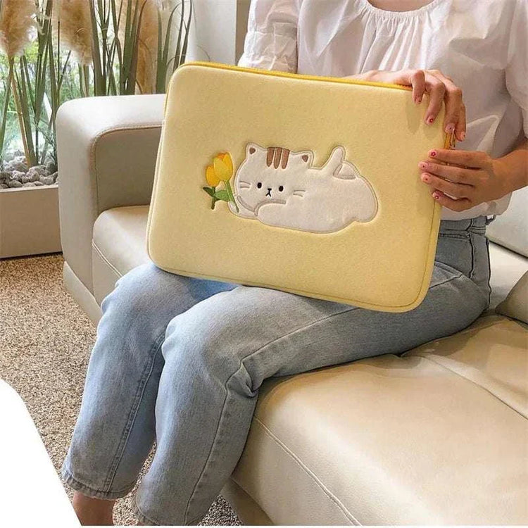 Women cute laptop sleeve case with cartoon design for protection.