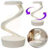 Floating moon table lamp with interactive rotation and gesture control.