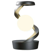 Floating moon table lamp with interactive rotation and gesture-controlled illumination.