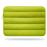 Green solid polyester laptop and tablet sleeve with zipper closure from SZEGYCHX, unisex style.