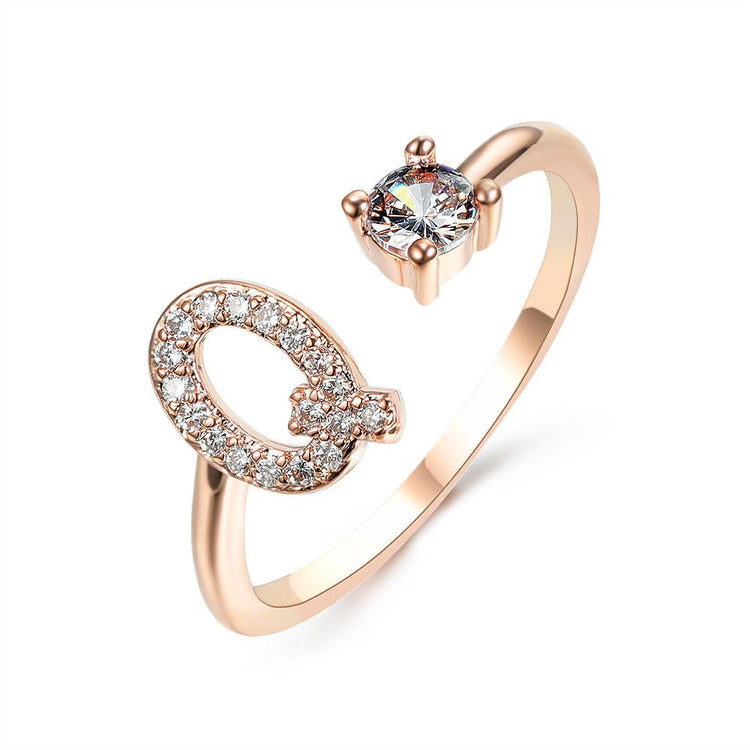 Elegant adjustable initial letter ring with zircon and copper alloy design.