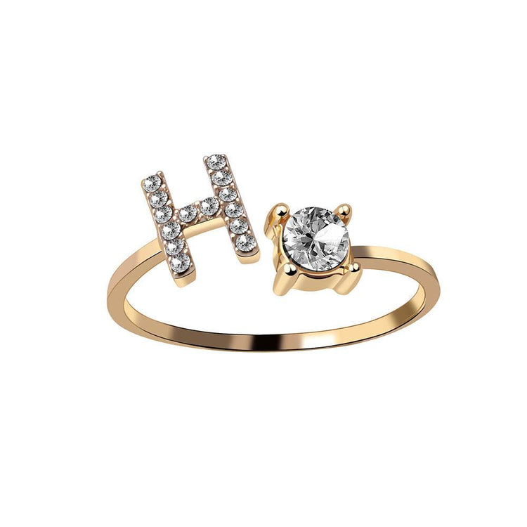 Gold adjustable initial letter ring with zircon stone, elegant fashion jewelry for women.