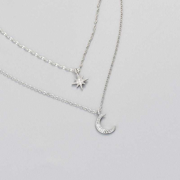 Moon double-layer necklace with rhinestone star and crescent charm, white gold color, affordable luxury clavicle chain for women.