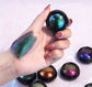 Chameleon eyeshadow in various colors, shown with swatch on hand.