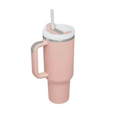 Pink thermos cup with handle and straw, insulated for hot and cold drinks.